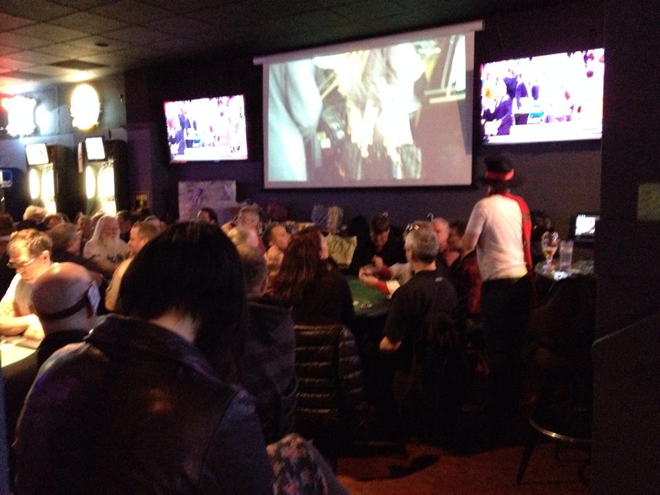Players gathered around the tables at the April 25 kickoff